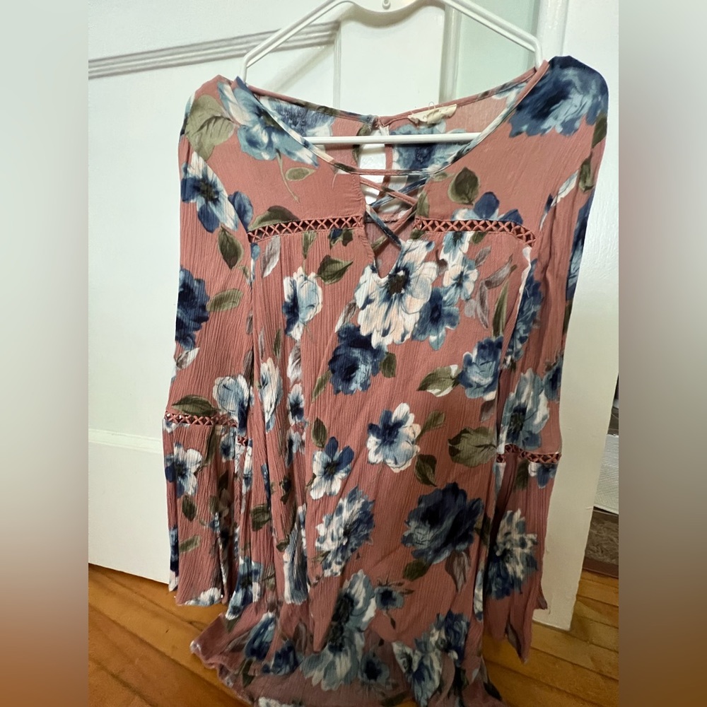 Dark pink long sleeve top with blue/white flowers by Oddy.